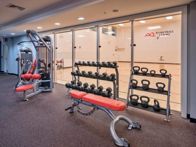 This image shows the fitness gym of TGM Anchor Point Marina featuring the kettlebell and dumbell. It's also accessible to the indoor basketball court.