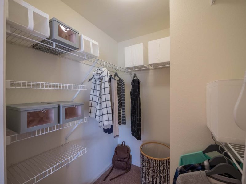 This image shows the premium apartment feature that includes a Walk-in closets that was suitable for an easy area to put your clothes.